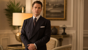 Refined butler in dark suit standing in upscale living room
